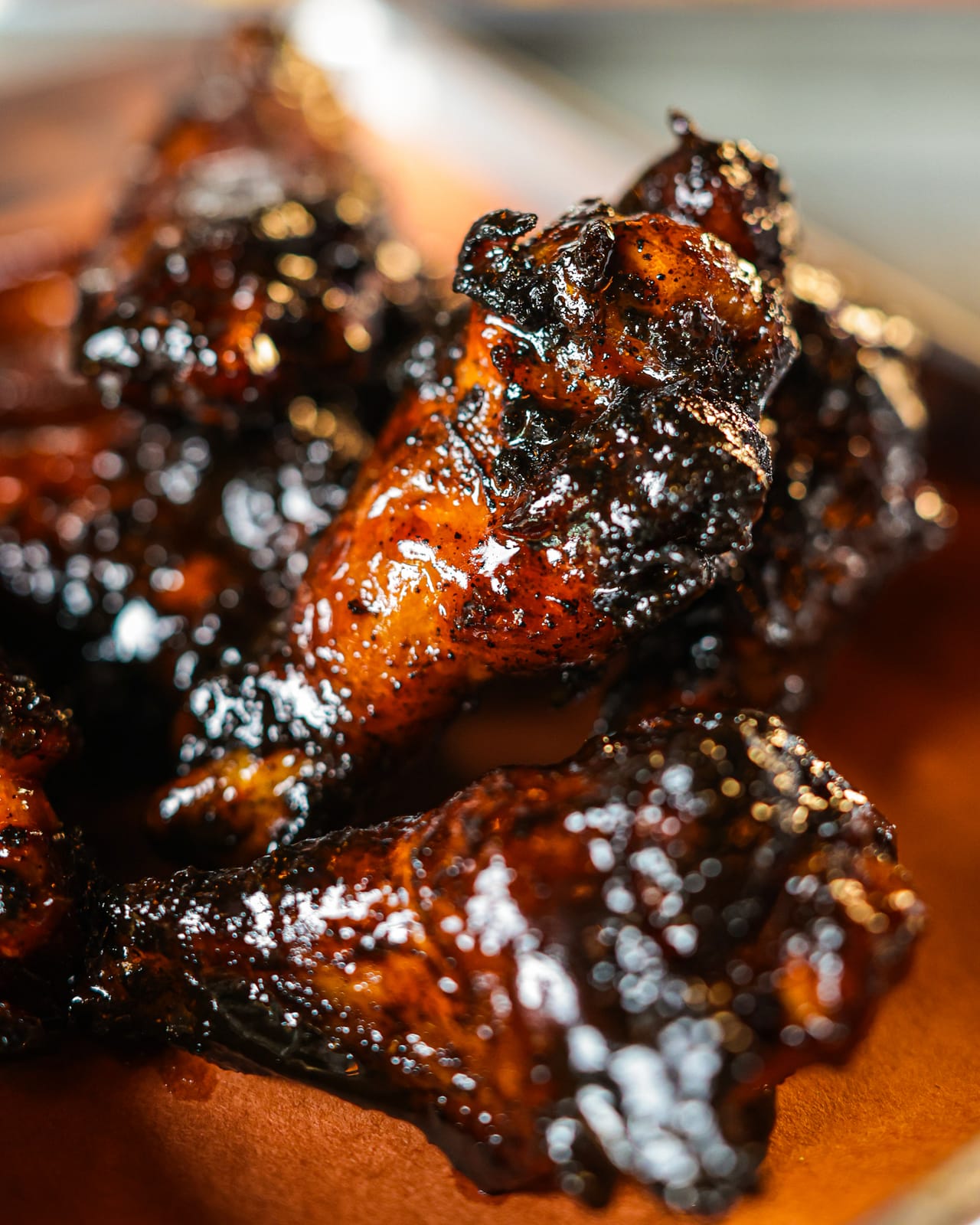 Smokafried wings glazed in oro negro sauce with a cafecito rub at Apocalypse BBQ Kendall